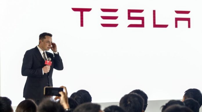 Electric car maker Tesla reports massive loss as demand dives