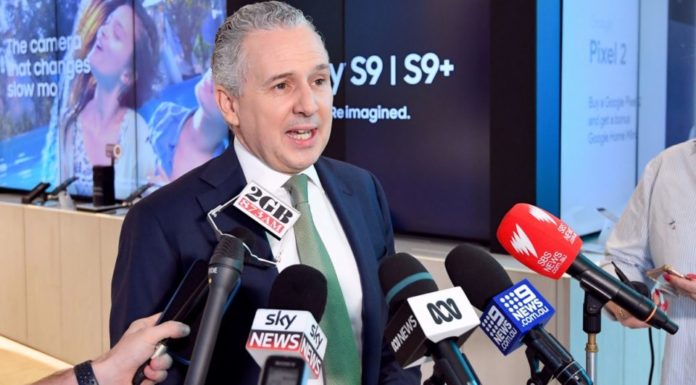 Telstra to slash $500m, limits job cuts