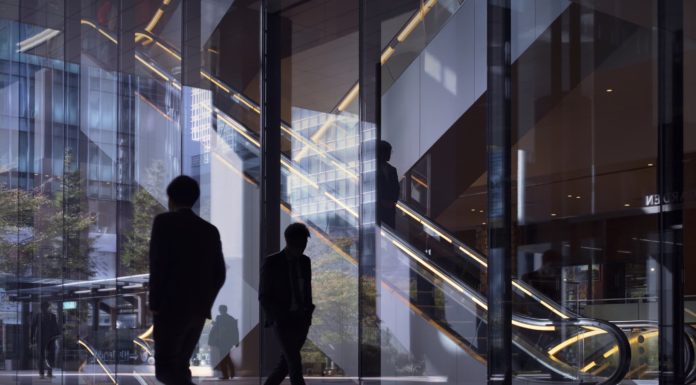 The return-to-office date is ‘history,’ business and health experts say – CNBC