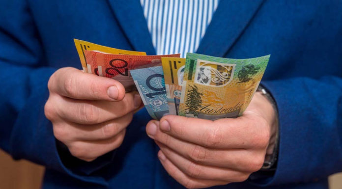 ‘Not a pretty scenario’: Wages set to rise in 2022, but inflation could steal workers’ gains