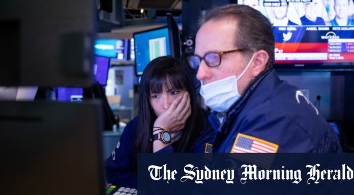 ASX rises despite Wall Street losses; Bitcoin tumbles